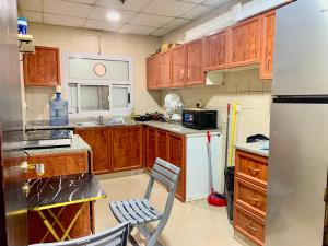 Η κουζίνα ή μικρή κουζίνα στο Falcon Living Hostel