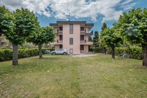 Zahrada ubytování Casa Lugana 20 - monolocale con piscina fronte lago