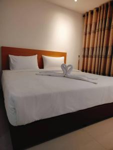 Postel nebo postele na pokoji v ubytování One Dream Hotel