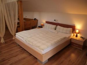 Postel nebo postele na pokoji v ubytování Haus Schober