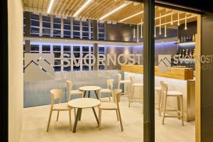 Reštaurácia alebo iné gastronomické zariadenie v ubytovaní Wellness Hotel Svornost