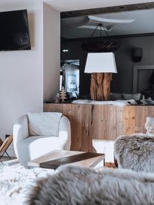 Posezení v ubytování Chalet Hotel Le Mont Bisanne