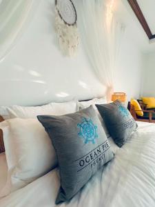 Postel nebo postele na pokoji v ubytování Ocean Pie Phuket - Adult Only