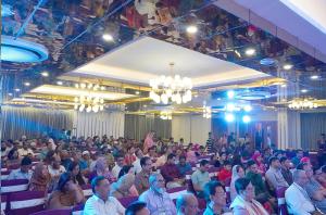 a large crowd of people sitting in a large room at Grand River View Hotel - Rajshahi in Rājshāhi