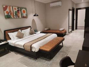 Tempat tidur dalam kamar di Maira Resort and Convention Center