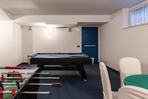 Biliár nebo kulečník v ubytování Hotel garni Meledrio