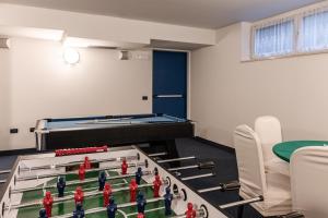 Herní místnost v ubytování Hotel garni Meledrio