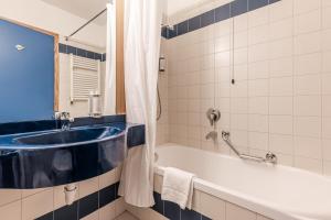 Koupelna v ubytování Hotel garni Meledrio