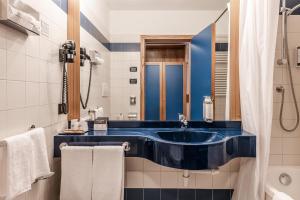 Koupelna v ubytování Hotel garni Meledrio