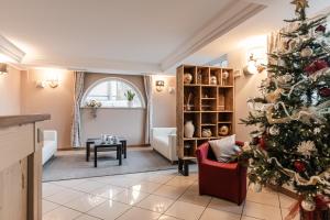 Posezení v ubytování Hotel garni Meledrio
