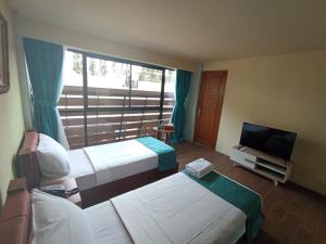 Et tv og/eller underholdning på The Culture Hotel And Gallery