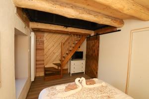 Postel nebo postele na pokoji v ubytování L'Hôtel Enfoncé, chambres d'hôtes