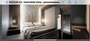 rest bellavista客房内的一张或多张床位