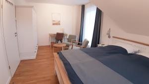 Postel nebo postele na pokoji v ubytování Ferienhaus Deich Alma