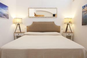Posteľ alebo postele v izbe v ubytovaní Guest house Acuario