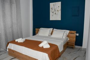 Postel nebo postele na pokoji v ubytování Garden Villa Afytos
