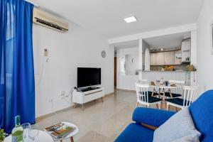TV a/nebo společenská místnost v ubytování Apartment Manzanera 5 - PlusHolidays