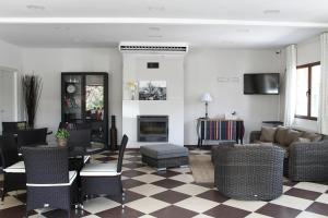 Posezení v ubytování Hostal Landhaus