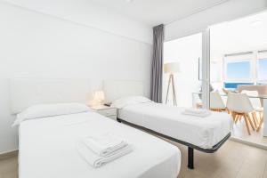 Posteľ alebo postele v izbe v ubytovaní Santa Margarita Deluxe 14-D Levante Beach + 24 fotografií