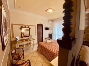 TV a/nebo společenská místnost v ubytování Art Hotel Pandos