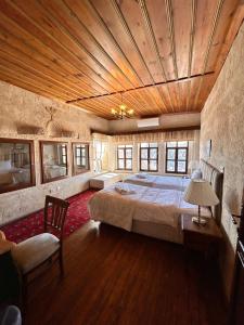 Postel nebo postele na pokoji v ubytování Hotel Temenni Evi