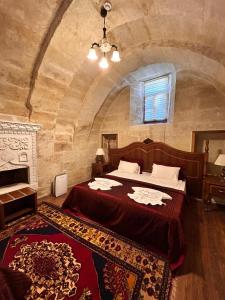 Postel nebo postele na pokoji v ubytování Hotel Temenni Evi