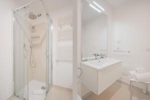 Koupelna v ubytování Felix Hotels - Residence Hotel Grandi Magazzini + 37 fotografií