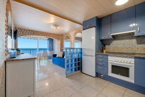 Kuchyň nebo kuchyňský kout v ubytování Hauzify I Apartament Plenamar
