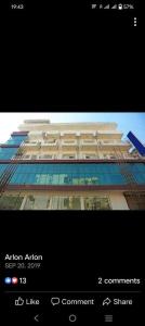 a screenshot of a building with a picture of it at Laxmi Stay Hotel in New Delhi