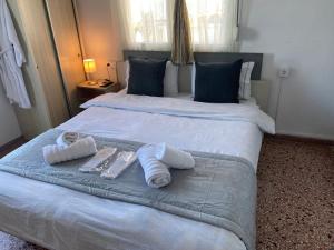Кровать или кровати в номере Sunset view Rooms