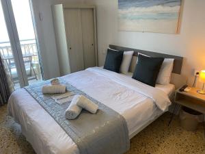 Кровать или кровати в номере Sunset view Rooms