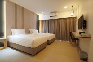Alto Hotel M客房内的一张或多张床位