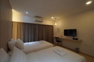 Alto Hotel M客房内的一张或多张床位