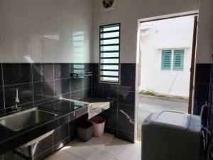 Ένα μπάνιο στο Tmn seri botani ipoh greece 4br 14pax mahjong