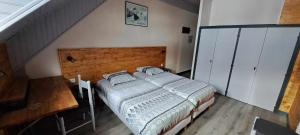 Postel nebo postele na pokoji v ubytování Hotel Valérie