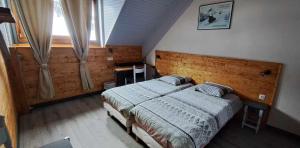 Postel nebo postele na pokoji v ubytování Hotel Valérie