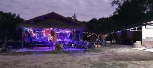 a gazebo with christmas lights on it at Scorpion Wings Eco-Resort in Ban Na Nga