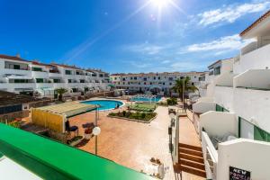 a view of the pool from the balcony of a apartment at Soleado en Alondras Park in Costa Del Silencio