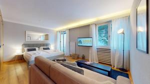 Postel nebo postele na pokoji v ubytování Abitaziun Residence 10A - St Moritz