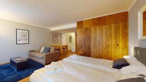 Postel nebo postele na pokoji v ubytování Abitaziun Residence 10A - St Moritz