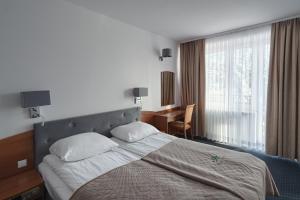 Zespół Tatry - Hotel Tatry i Budynek Turystyczny客房内的一张或多张床位