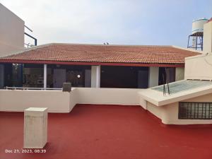 Balkón nebo terasa v ubytování GUBBI GOODU INN HOMESTAY + 7 fotografií