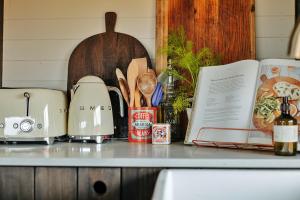 a kitchen counter with a counter top with a counter top at Finest Retreats - Foxley Lodge in Little Walsingham