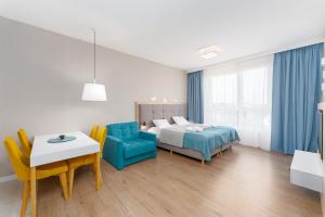 Posteľ alebo postele v izbe v ubytovaní Perfect Holiday Apartments Bel Mare by Noclegi Renters
