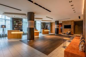 TV a/nebo společenská místnost v ubytování Courtyard by Marriott Cologne