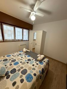 Łóżko lub łóżka w pokoju w obiekcie Mundaka Home