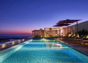 Bazén v ubytování Mysk Al Mouj Hotel nebo v jeho okolí