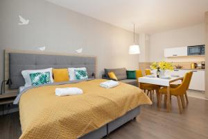 Posteľ alebo postele v izbe v ubytovaní Perfect Holiday Apartments Bel Mare by Noclegi Renters