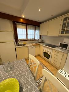 Kuchnia lub aneks kuchenny w obiekcie Mundaka Home