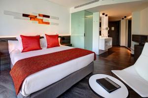 Postel nebo postele na pokoji v ubytování Olivia Balmes Hotel